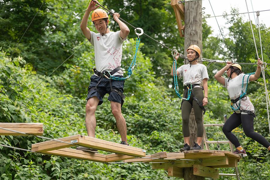 MBA sudents on ropes course